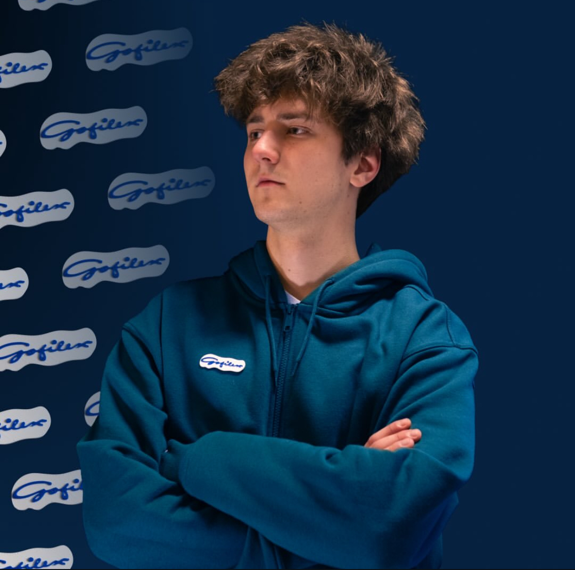 Gofilex badge worn on a blue jacket at a branded event