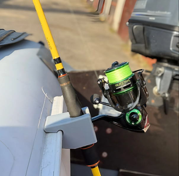 Fishing Rod Holder mounted on a PVC boat guide rail